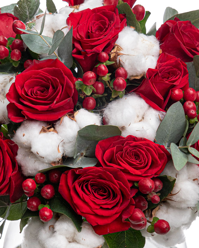 Bouquet of red roses and hypericum