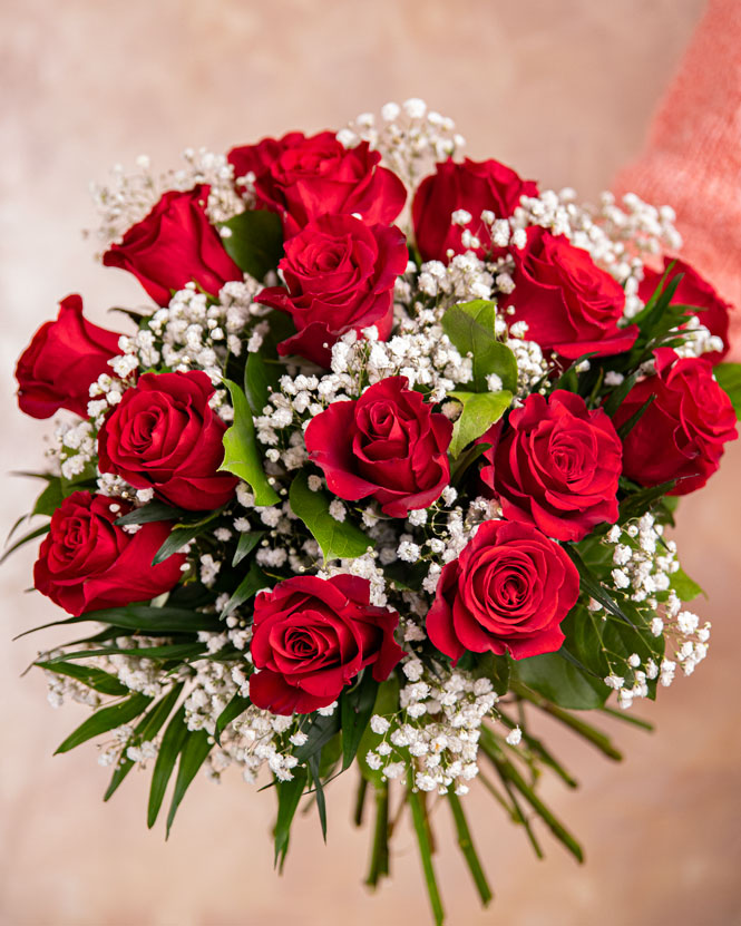Red roses and gypsophila bouquet