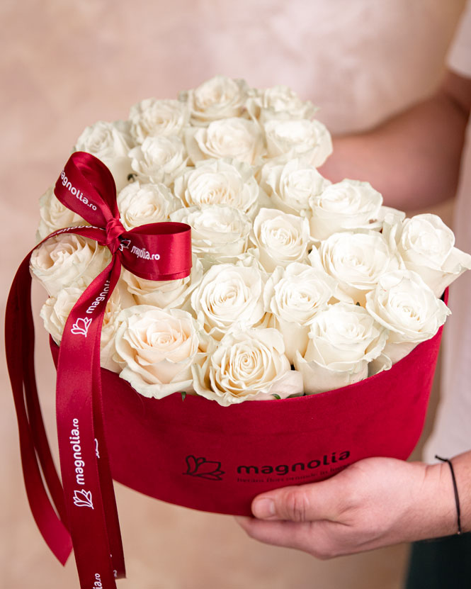 White roses in heart box