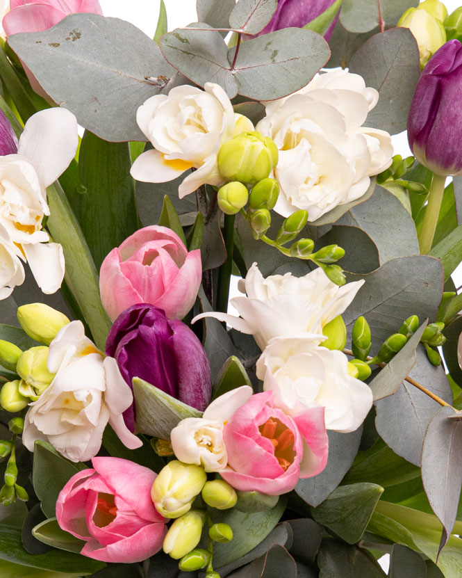 Bouquet with tulips and freesias and greenery