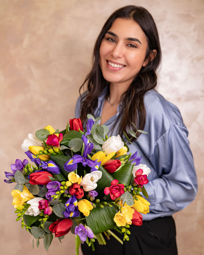 Bouquet with tulips, irises and freesias