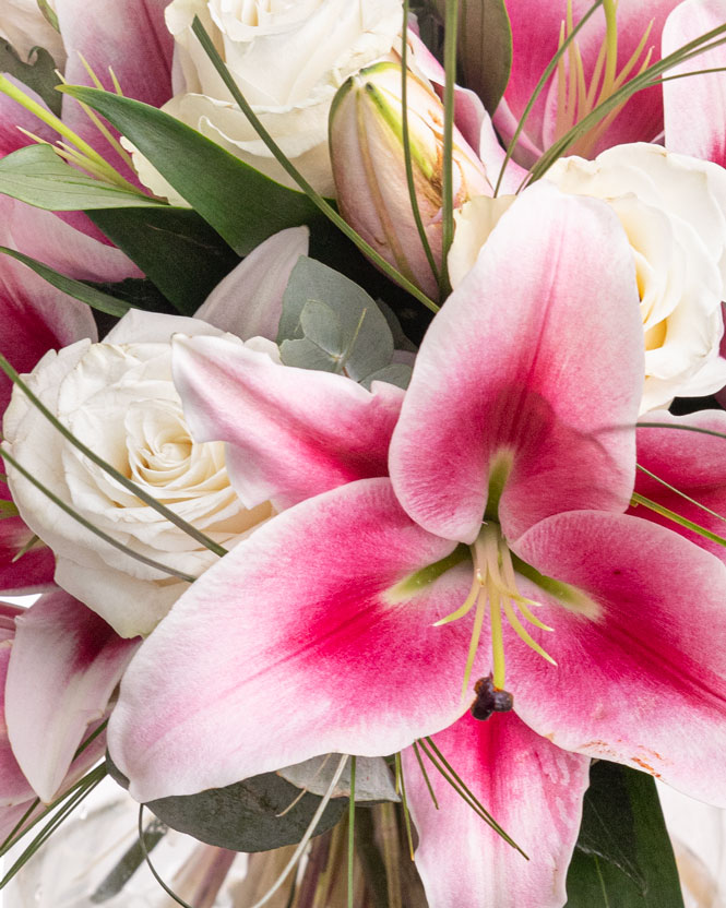 Bouquet of white roses and imperial lilies