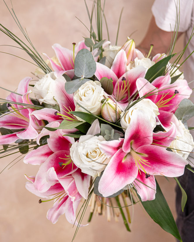 Bouquet of white roses and imperial lilies