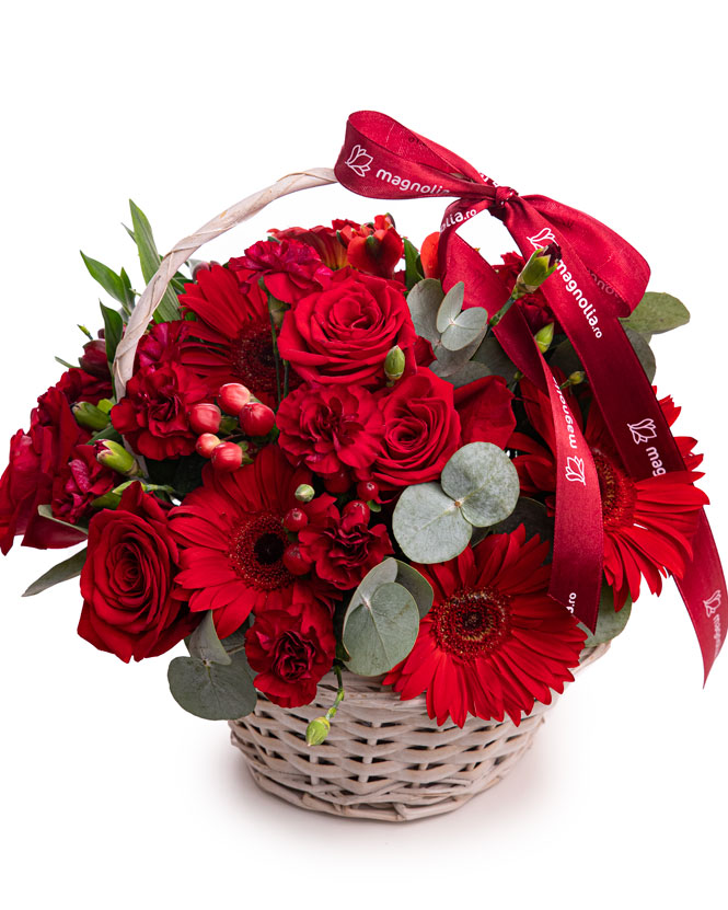 Basket with red gerbera and roses