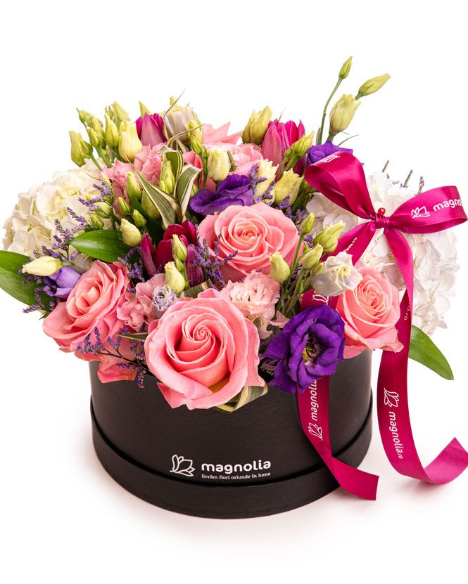 Delicate arrangement with roses and eustoma
