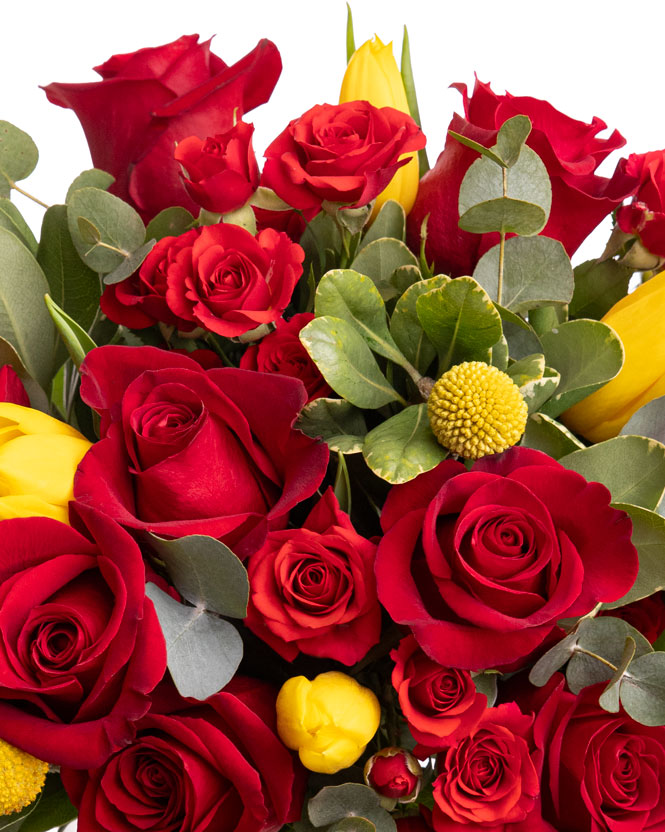 Bouquet with red roses, tulips and craspedia