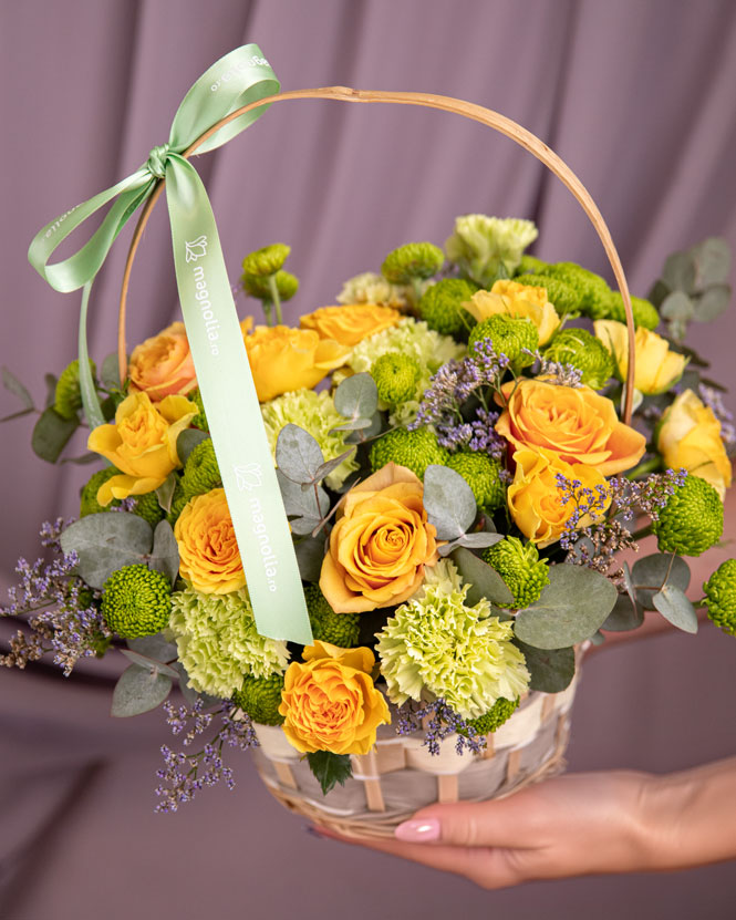 Basket with chrysanthemums and carnations