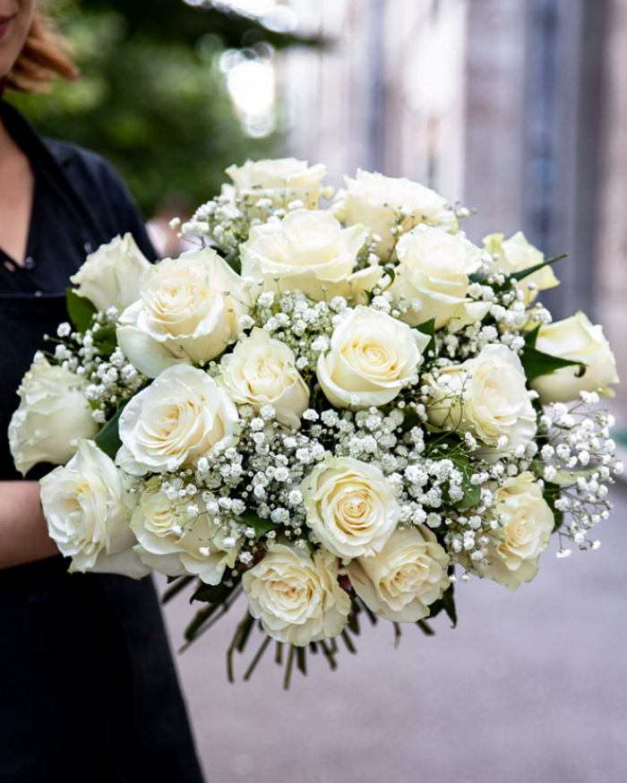 Bouquet of white roses and gypsophila