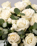 Bouquet with white roses and greenery
