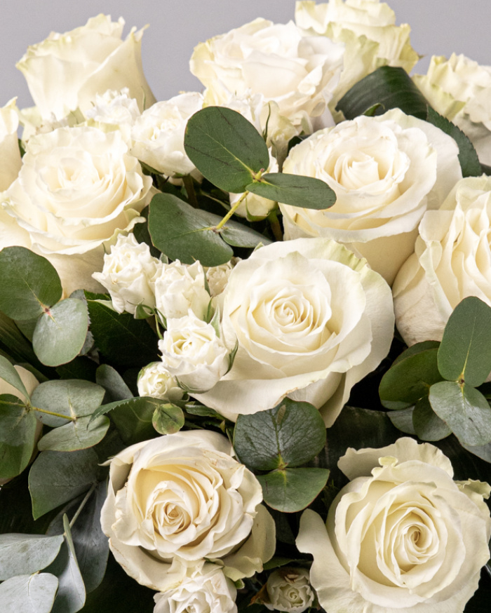 Bouquet with white roses and greenery