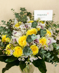 Exotic bouquet with Cymbidium orchid, roses, eucalyptus, Aralia leaves