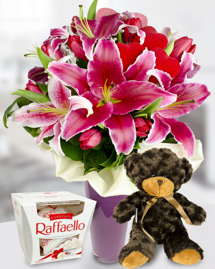 Bouquet of pink lilies and red tulips 