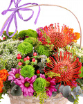 Basket with bright flowers – the image 2