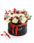 Box with roses and winter accesories