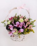 Basket with orchids and solidago