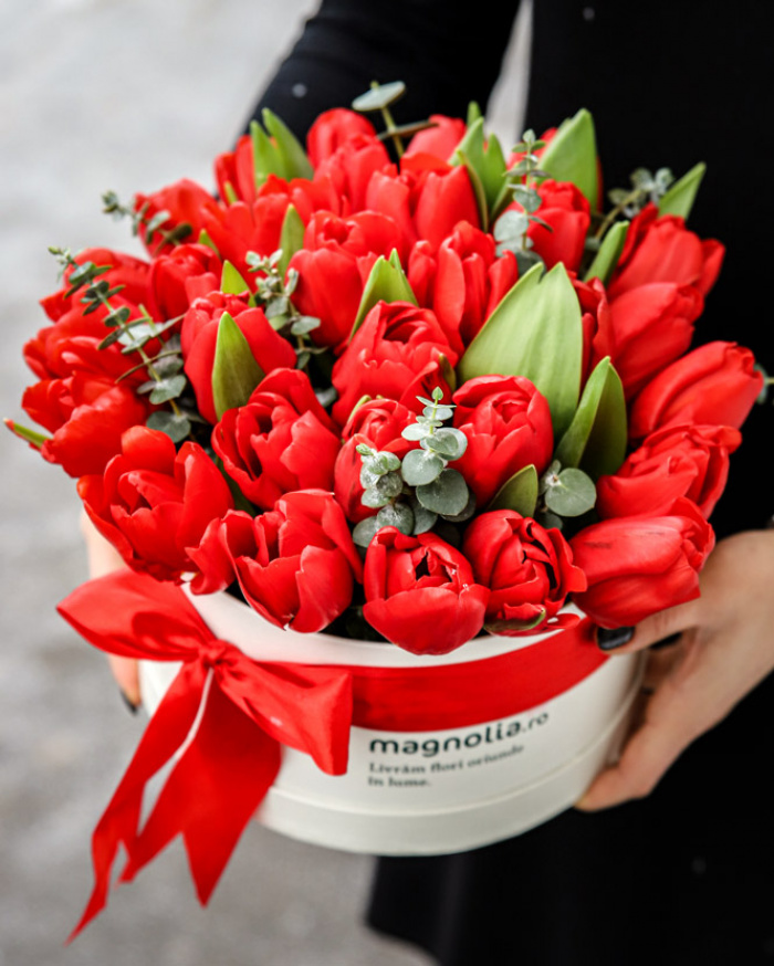 Box with red tulips