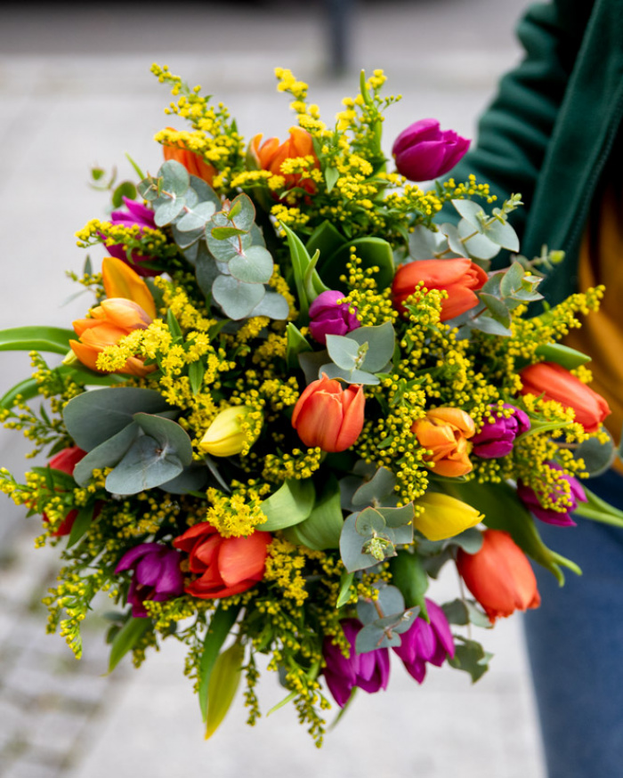 Tulips and solidago bouquet
