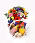 Tasty gift basket and colorful bouquet
