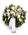 Funeral wreath with white roses and lilies