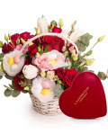 Easter basket with chocolate and a cute bunny – imaginea 1