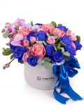 Arrangement with blue roses and orchids