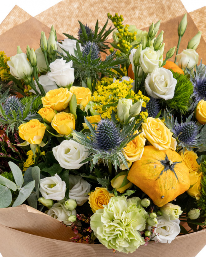 Roses, eustoma and ornamental pumpkins bouquet
