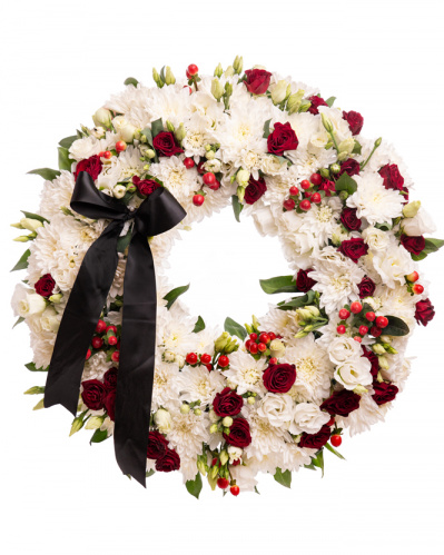 Elegant funeral wreath with white chrysanthemums