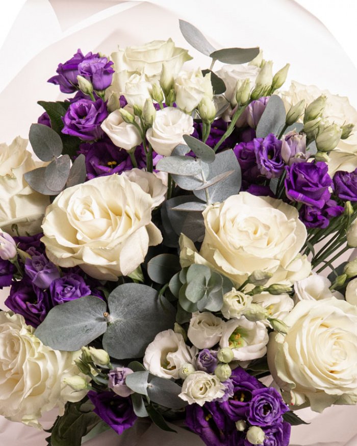 Bouquet with white roses and irises